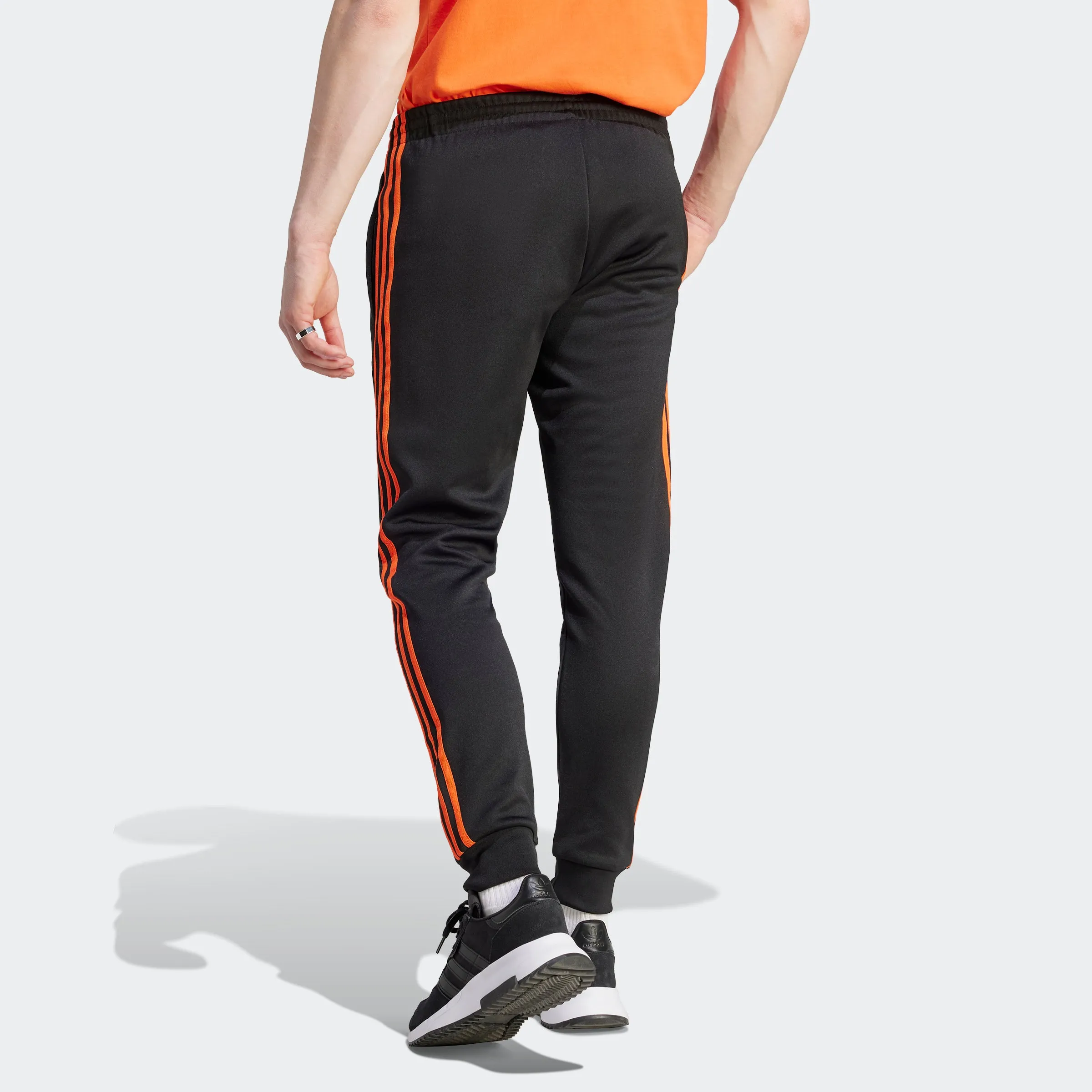 Men's adidas Originals Adicolor Classics SST Track Pants Black Orange