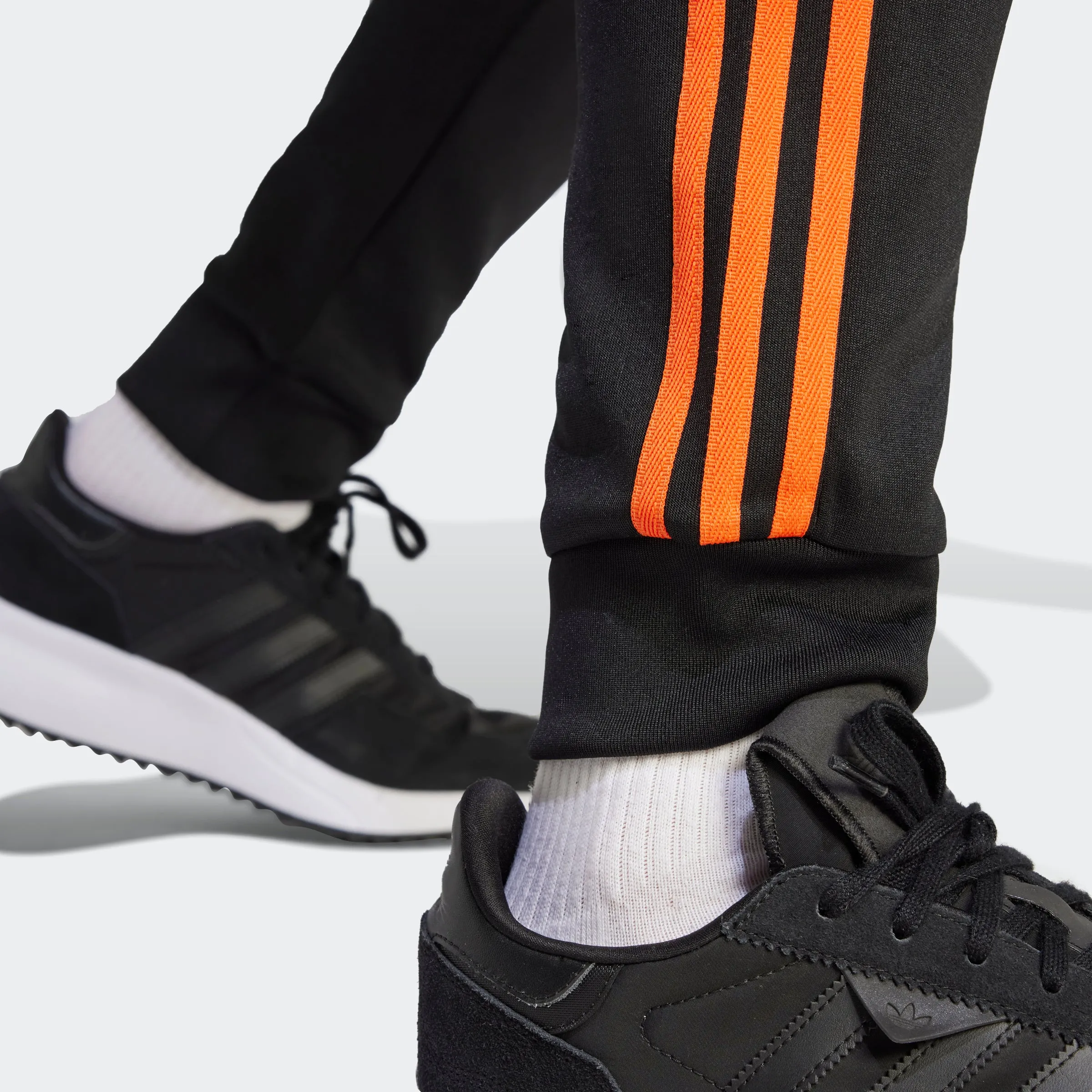 Men's adidas Originals Adicolor Classics SST Track Pants Black Orange